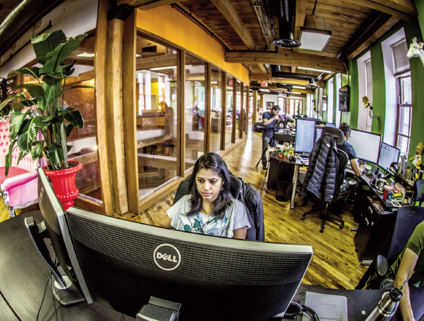 Krishna Tatta, senior software developer, is hard at work at the funeralOne headquarters in Detroit.